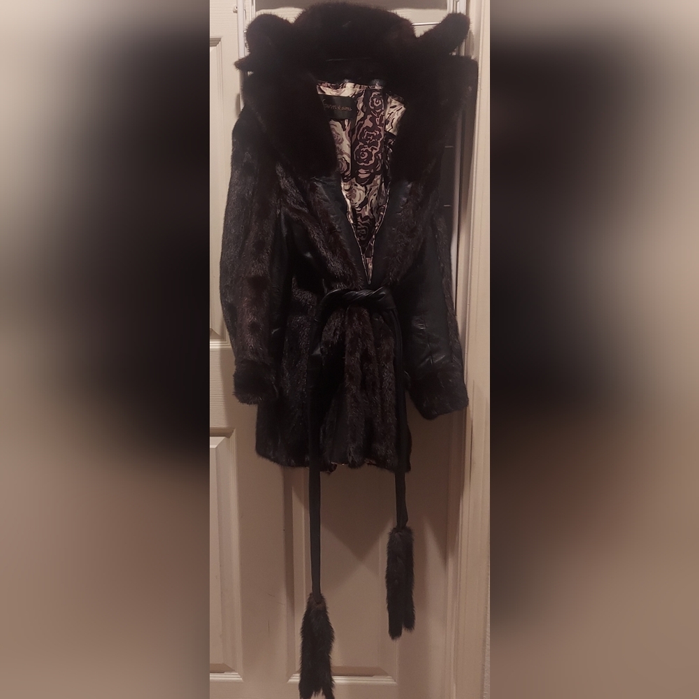 a Sterns & sons leather fur coat